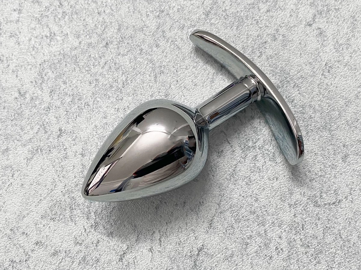 Dụng cụ kích thích h&acirc;̣u m&ocirc;n inox c&oacute; tay cầm