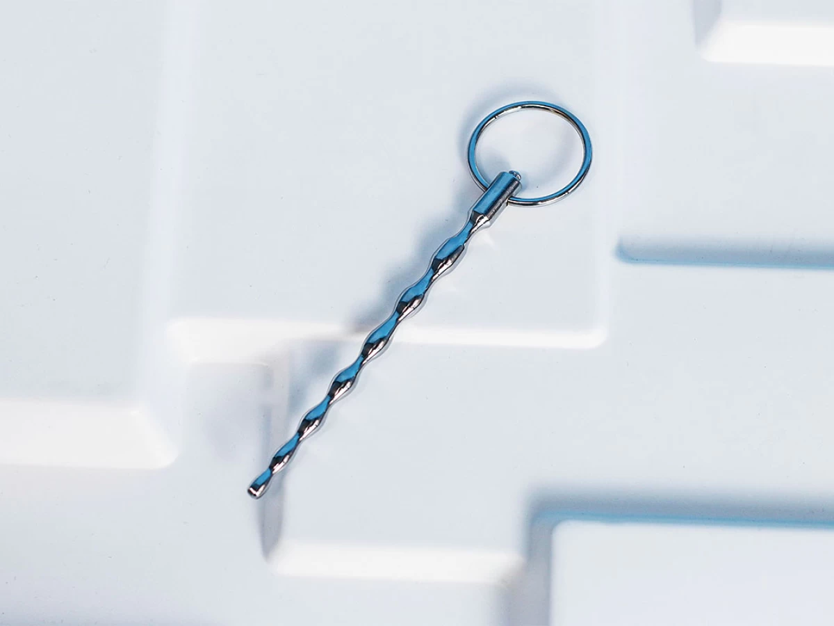 Dụng cụ kích thích niệu đạo có khoen